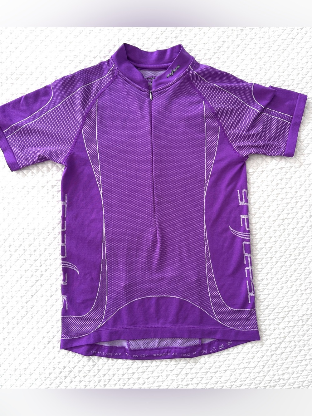 SheBeest bicycling jersey in women’s medium. Great condition. Back zip pocket.